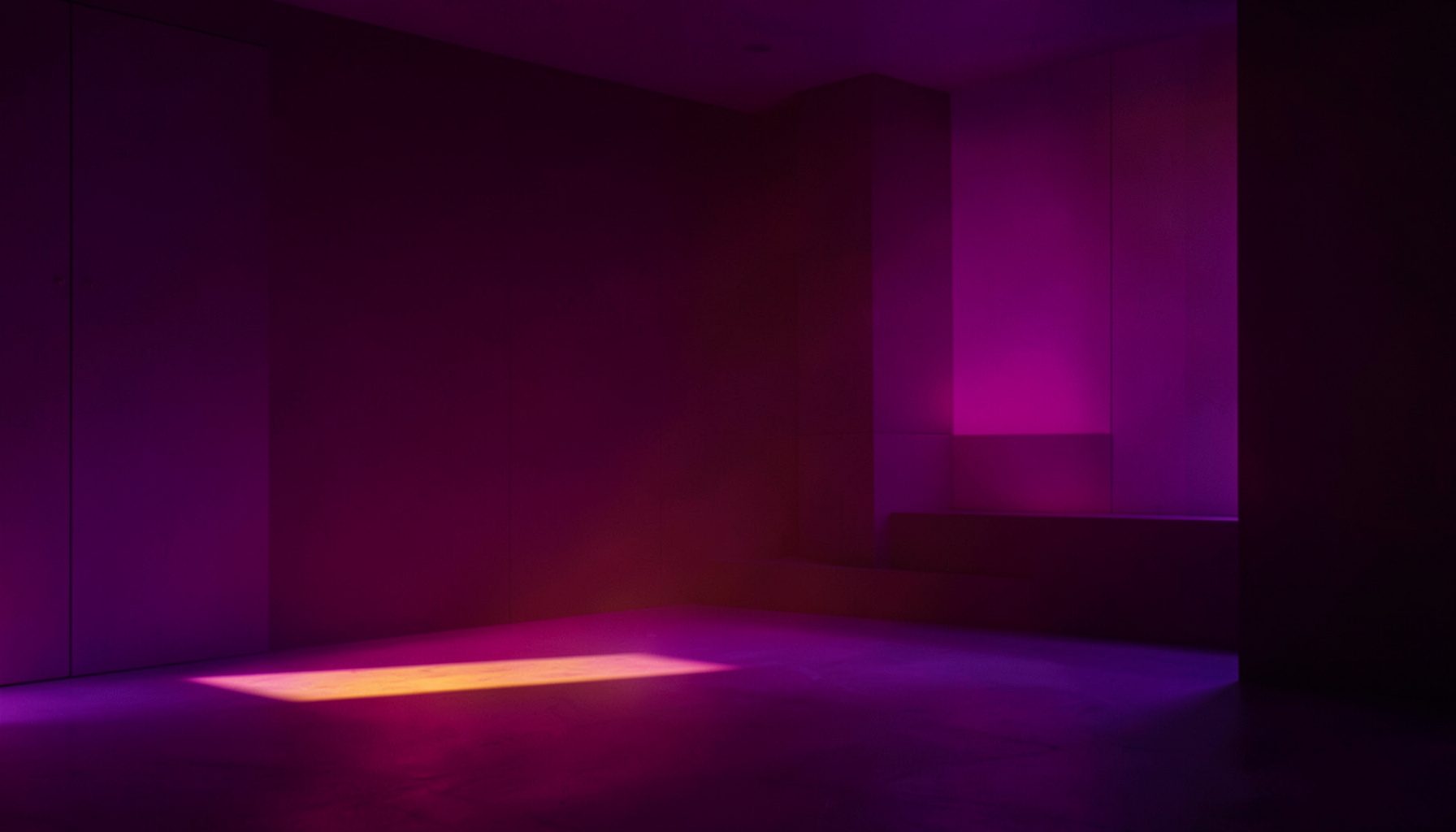 Magenta and purple neon glow across a dark minimalist interior with clean lines